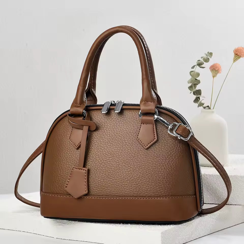 Bolsa minimalista de cuero moderno Faro