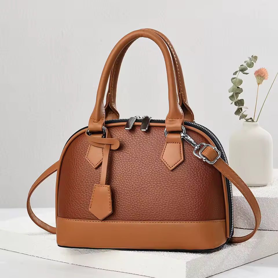 Bolsa minimalista de cuero moderno Faro